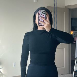 Back cut out turtle neck